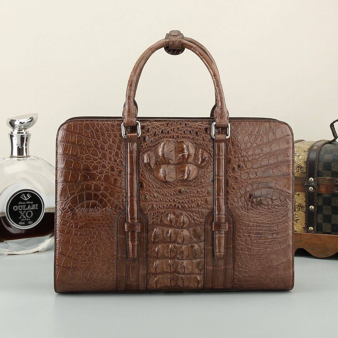 Black and brown crocodile leather Rossie Viren handbag with structured briefcase design and top handle.