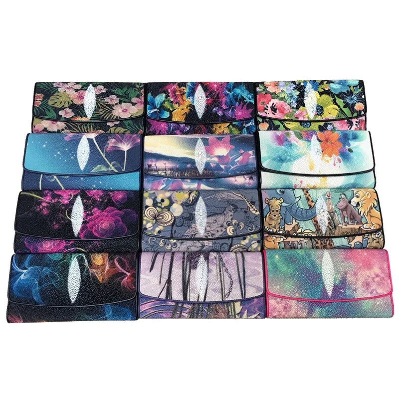 Genuine stingray tri-fold wallet with floral design for women by Rossie Viren, showcasing textured stingray leather and floral accents.