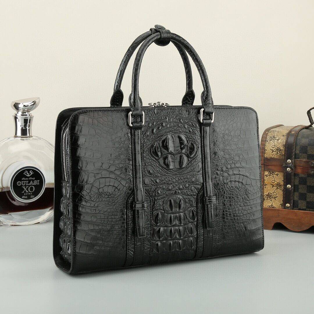 Black and brown crocodile leather Rossie Viren handbag with sturdy handles and sleek design.
