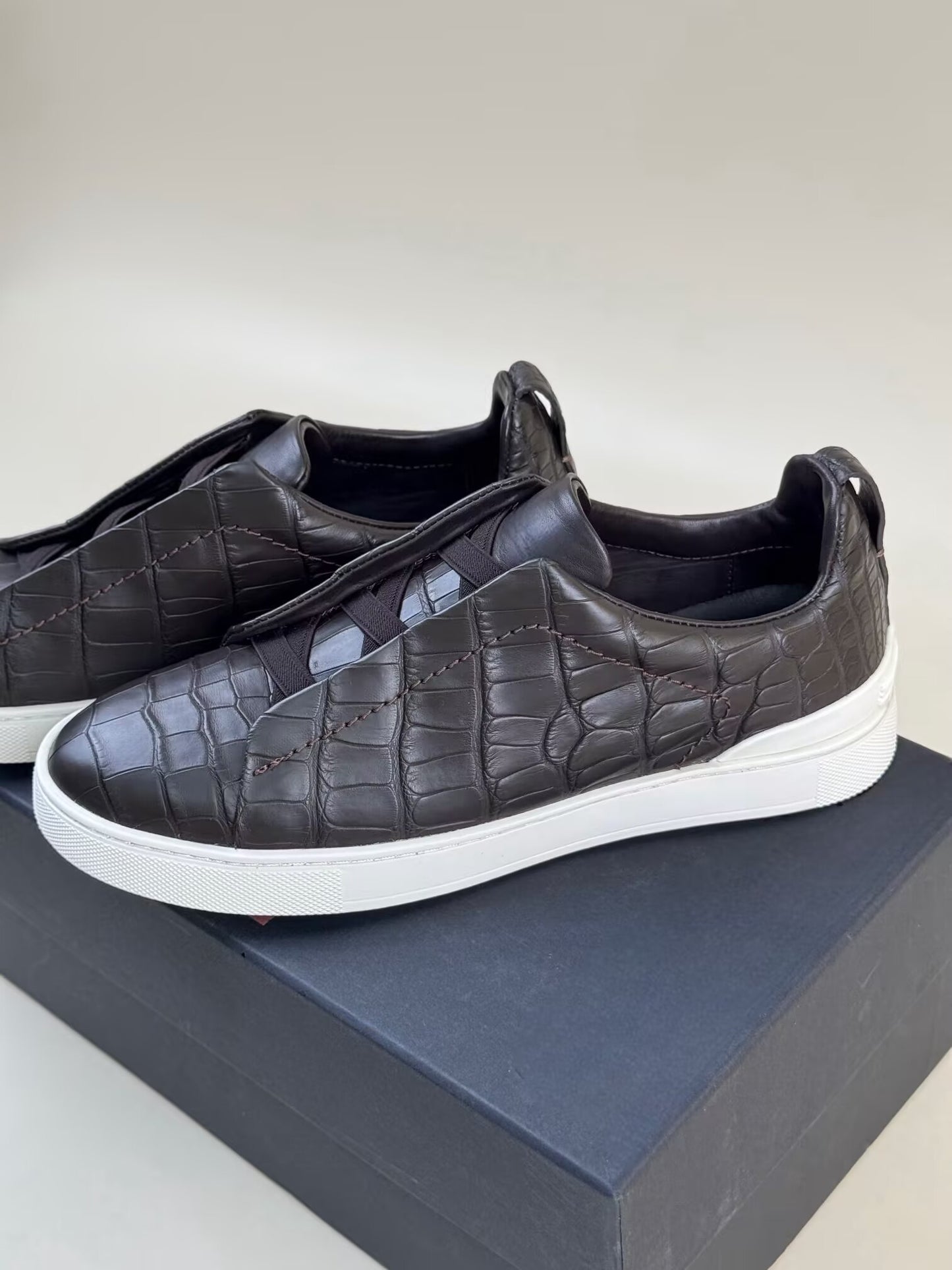 Brown Rossie Viren genuine crocodile skin leather sneakers, stylish shoes with textured crocodile pattern and lace-up design.
