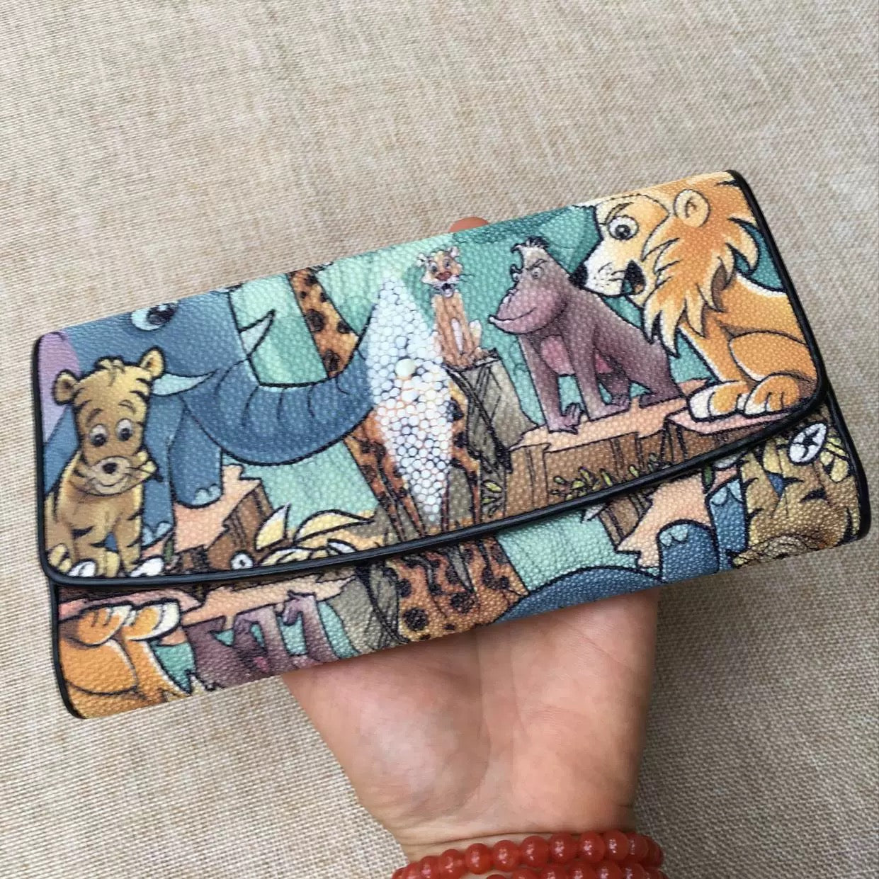 Genuine stingray TriFold wallet with floral design for women by Rossie Viren, featuring textured stingray leather and multiple card slots.