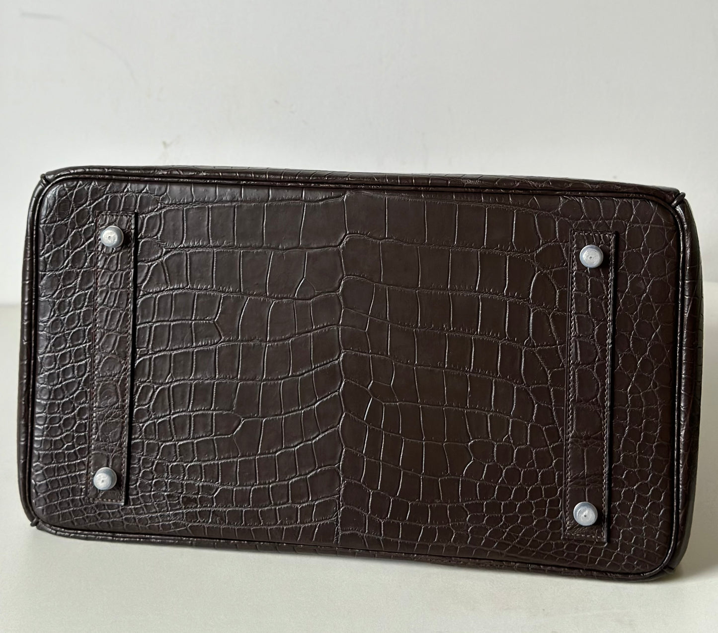 Brown Rossie Viren genuine Nile crocodile skin leather top handle bag with oversized 40cm padlock for business and office use.