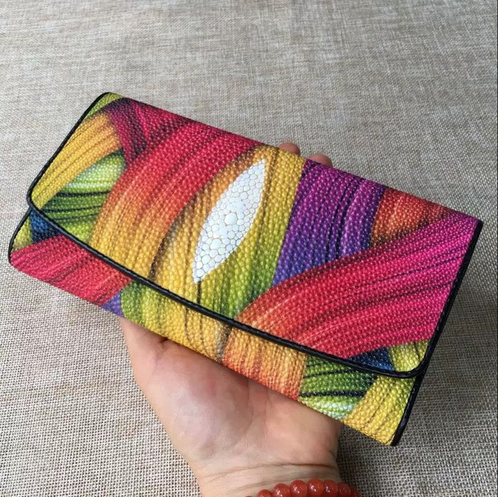 Genuine stingray TriFold wallet for women with floral design by Rossie Viren, showcasing textured stingray leather and floral accents.