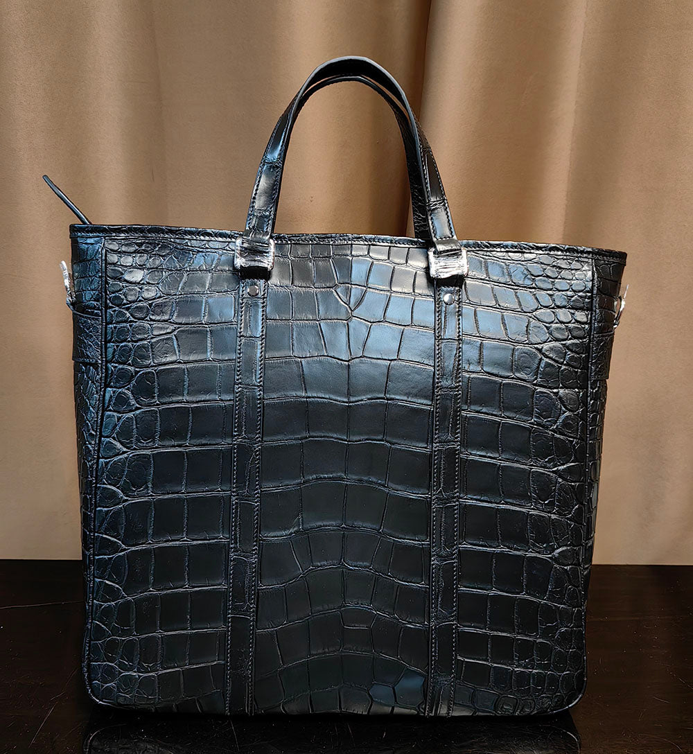 Unisex crocodile leather tote bag by Rossie Viren, large professional handbag with sleek crocodile texture and sturdy handles.