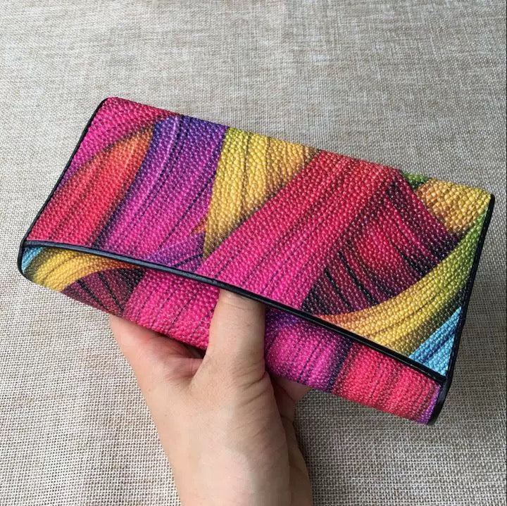 Genuine stingray TriFold wallet with floral design for women by Rossie Viren, showing textured stingray leather and colorful floral accents.
