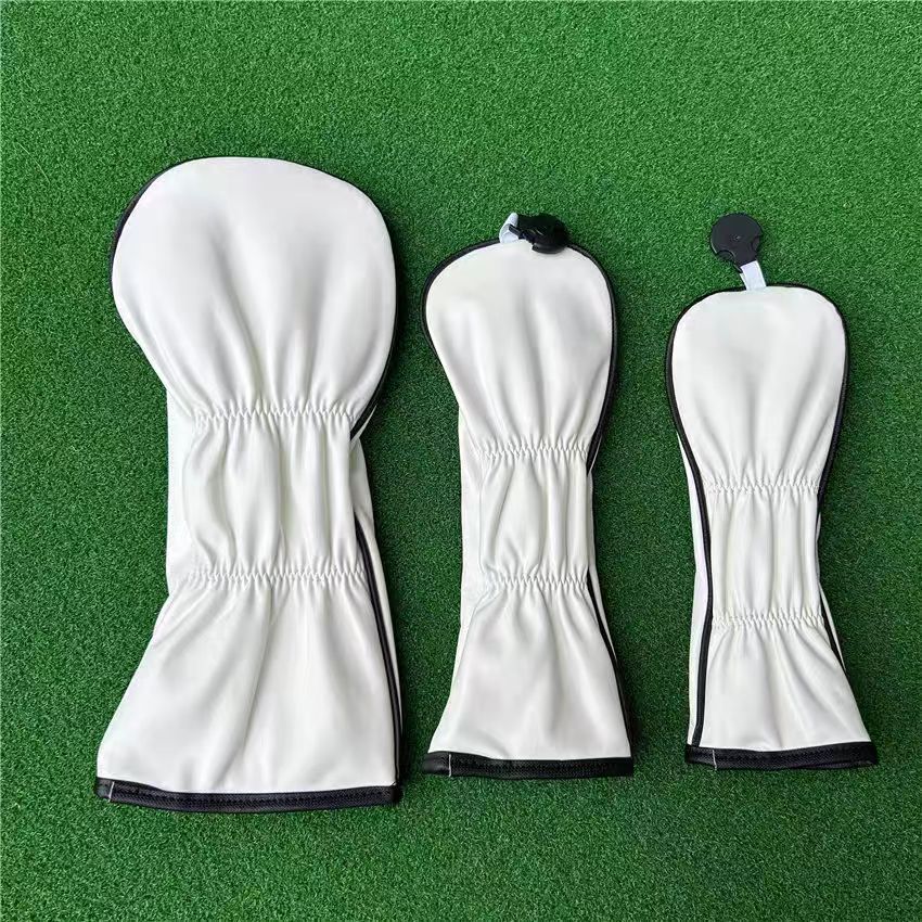 Rossie Viren crocodile leather golf head cover designed as a stylish handbag accessory, featuring textured crocodile pattern.