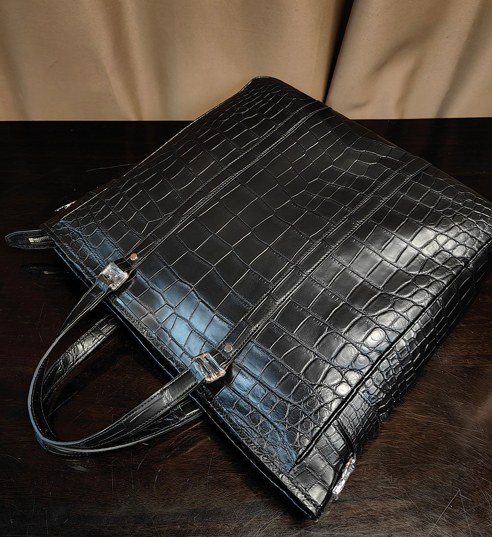 Unisex crocodile leather briefcase tote bag by Rossie Viren, large handbag with sturdy handles and textured crocodile pattern.