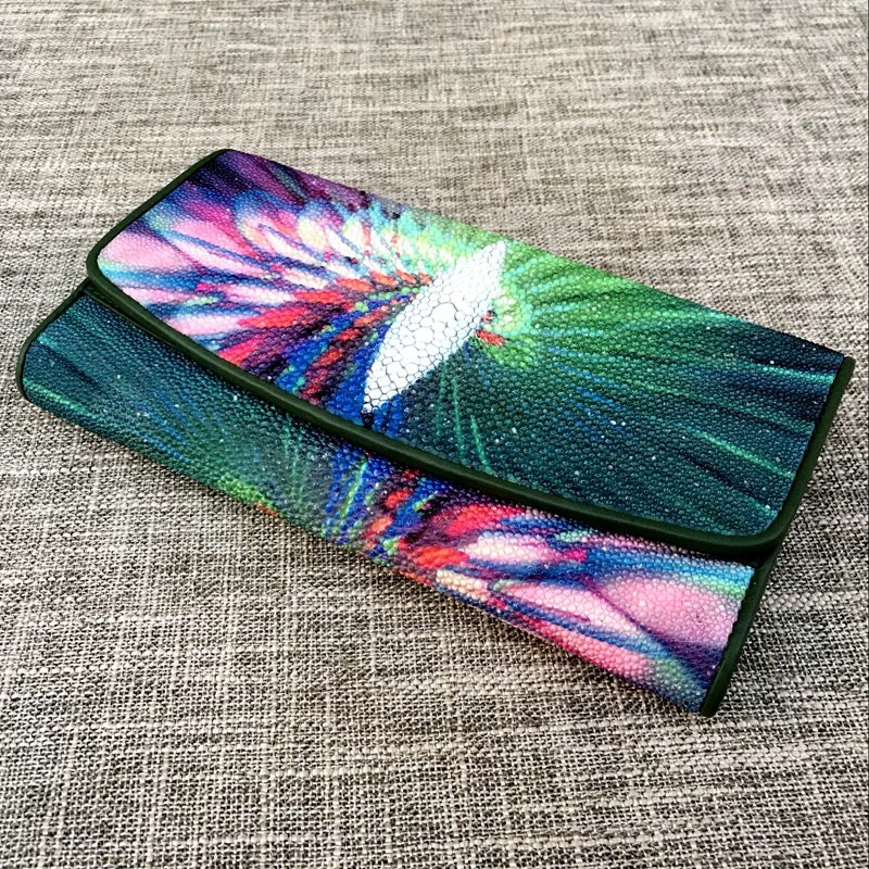 Genuine stingray tri-fold wallet with floral design for women by Rossie Viren, showcasing textured stingray leather and elegant floral accents.
