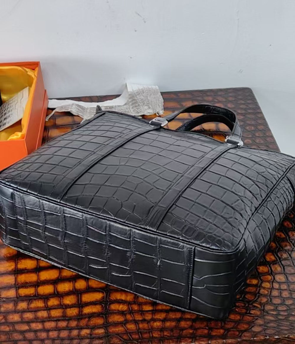 Unisex crocodile leather tote bag by Rossie Viren, large handbag with sturdy handles and detailed crocodile texture.
