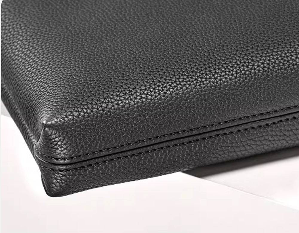 14-inch black leather Rossie Viren laptop briefcase handbag with grainy texture and classic design.
