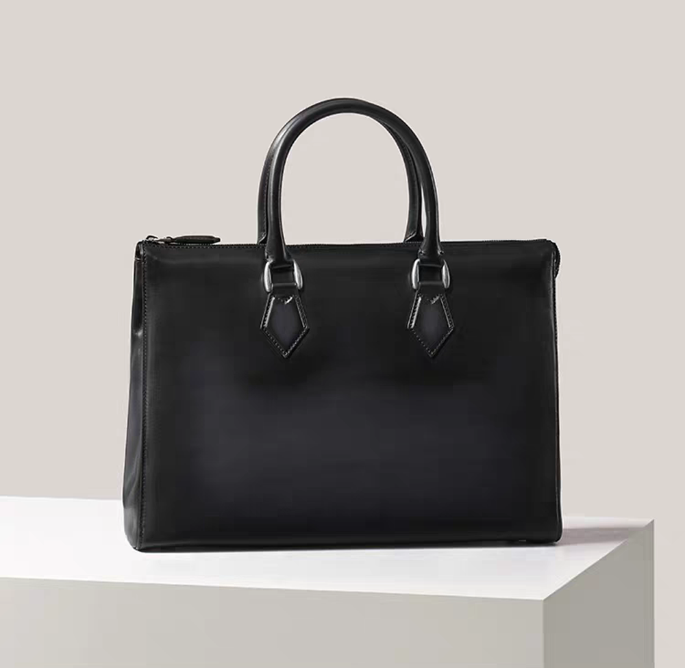 Vintage 14-inch leather laptop briefcase handbag by Rossie Viren, featuring classic design and imported high-quality leather.