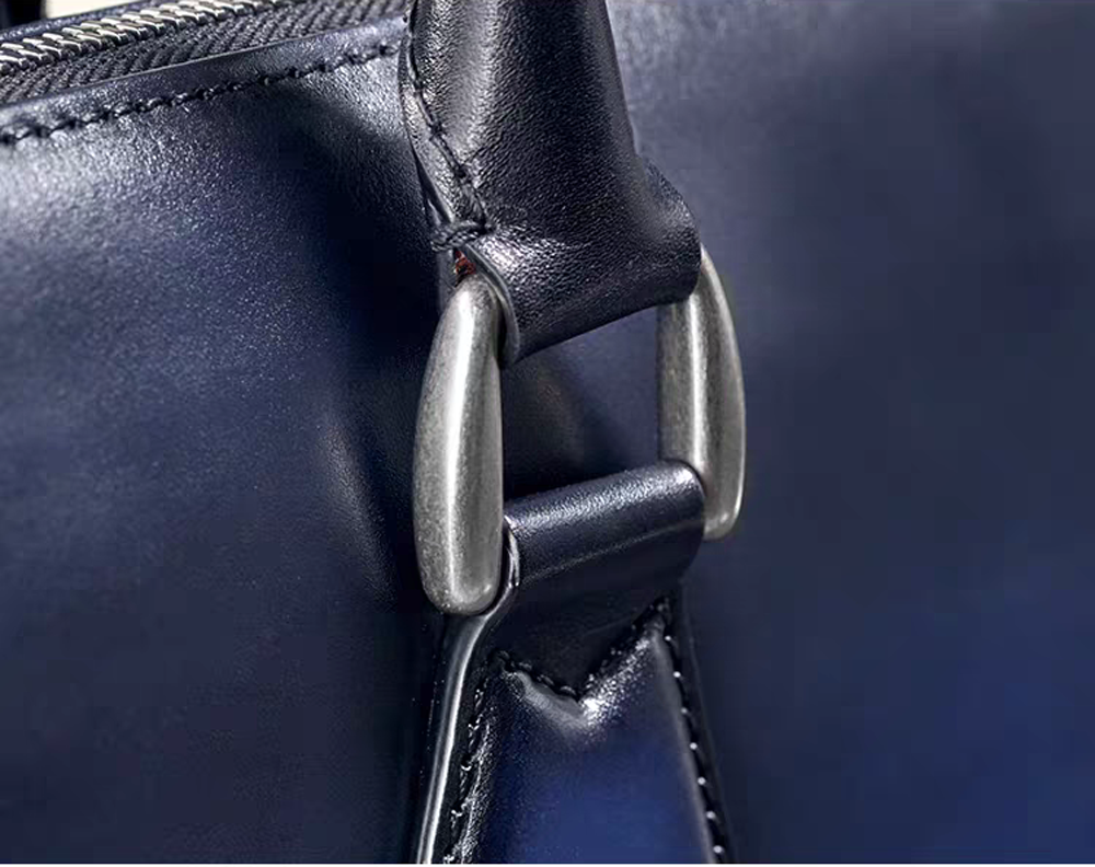 Vintage leather laptop briefcase bag by Rossie Viren, 14-inch imported handbag with classic design and sturdy handle.