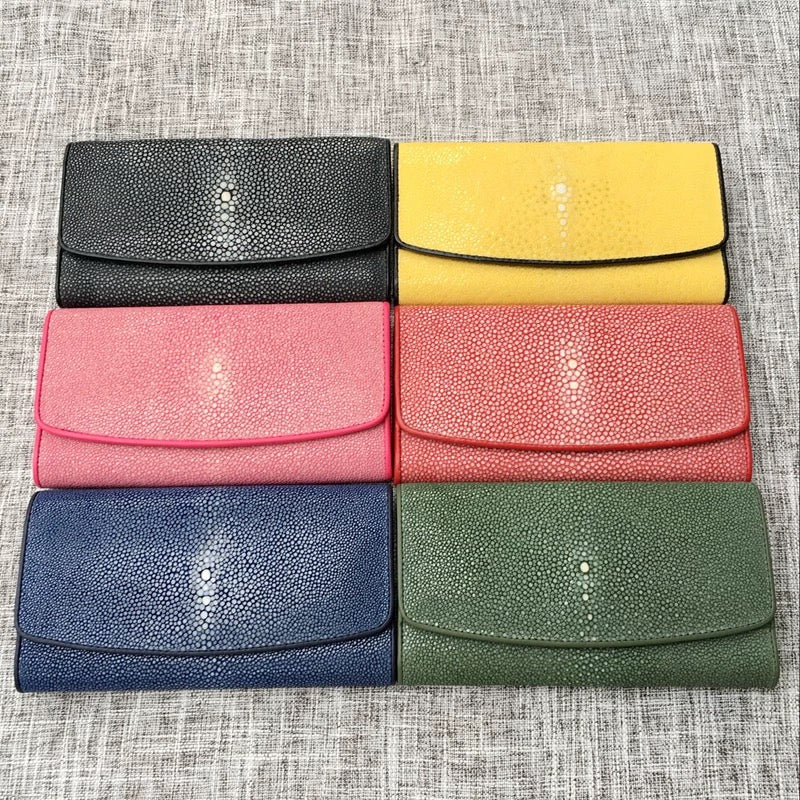 Genuine stingray tri-fold wallet with floral design for women by Rossie Viren, showing textured stingray leather and colorful floral accents.