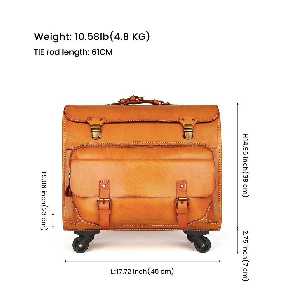 Vintage vegetable tanned leather carry-on rolling suitcase by Rossie Viren, with spinner wheels and classic camel finish.
