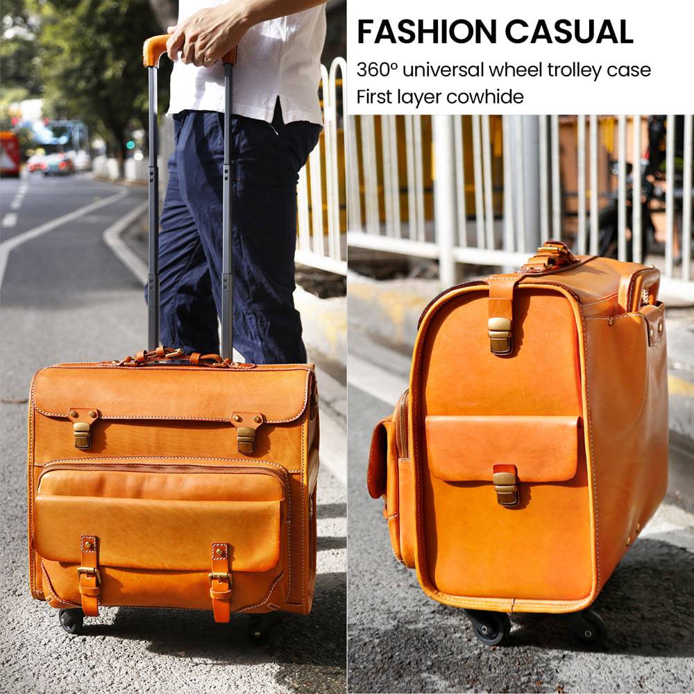 Vintage 20-inch vegetable tanned leather rolling suitcase by Rossie Viren, with spinner wheels and classic camel leather finish.