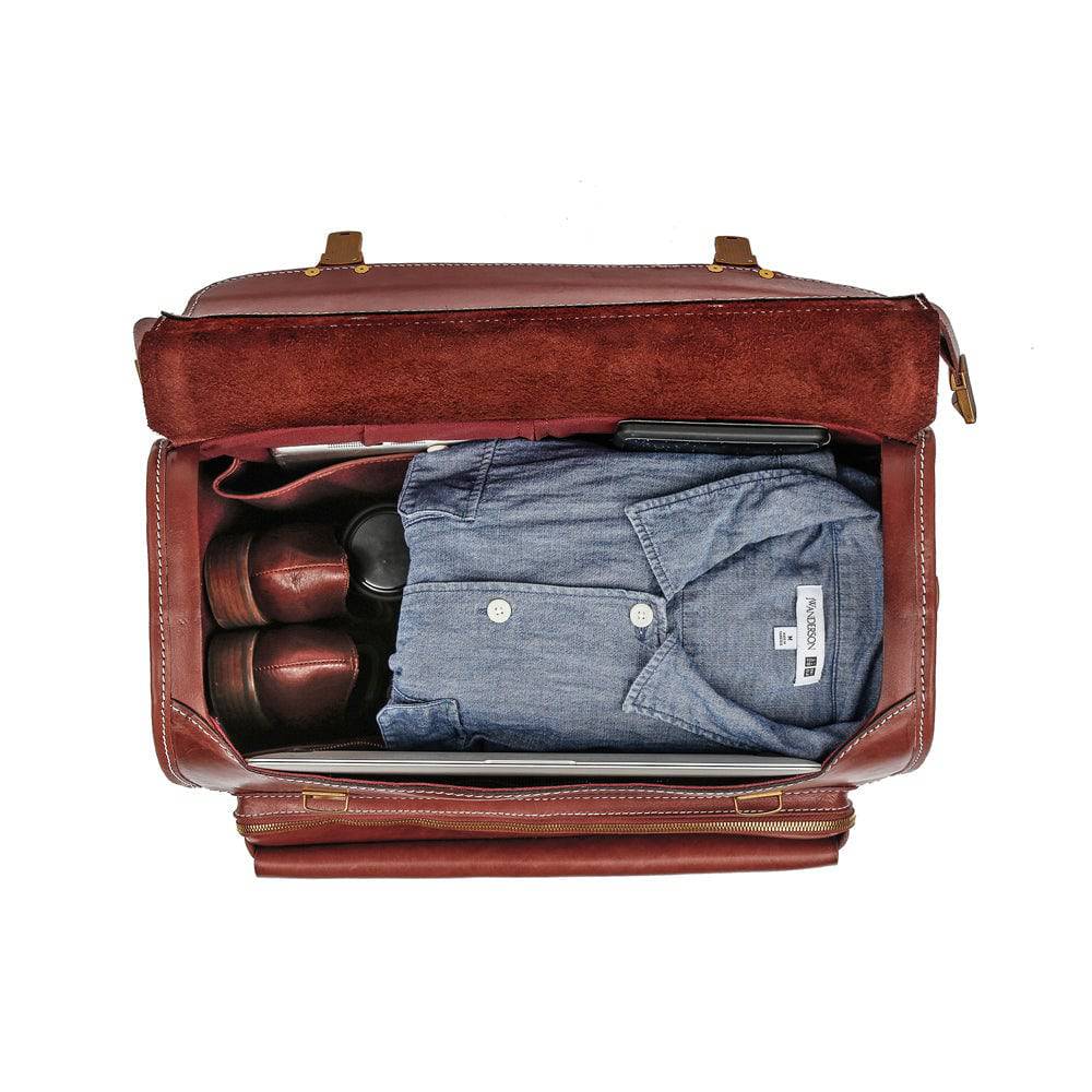 Vintage brown leather carry-on rolling suitcase with spinner wheels, 20-inch size, Rossie Viren vintage vegetable-tanned leather luggage.