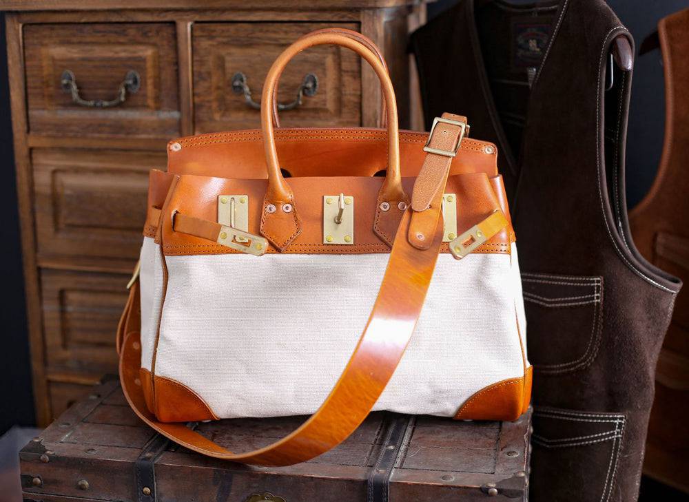 Unisex vintage oil wax leather top handle canvas bag by Rossie Viren with large size and sturdy leather straps.