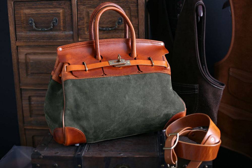 Unisex vintage oil wax leather top handle canvas bag by Rossie Viren with large size and sturdy leather handles.