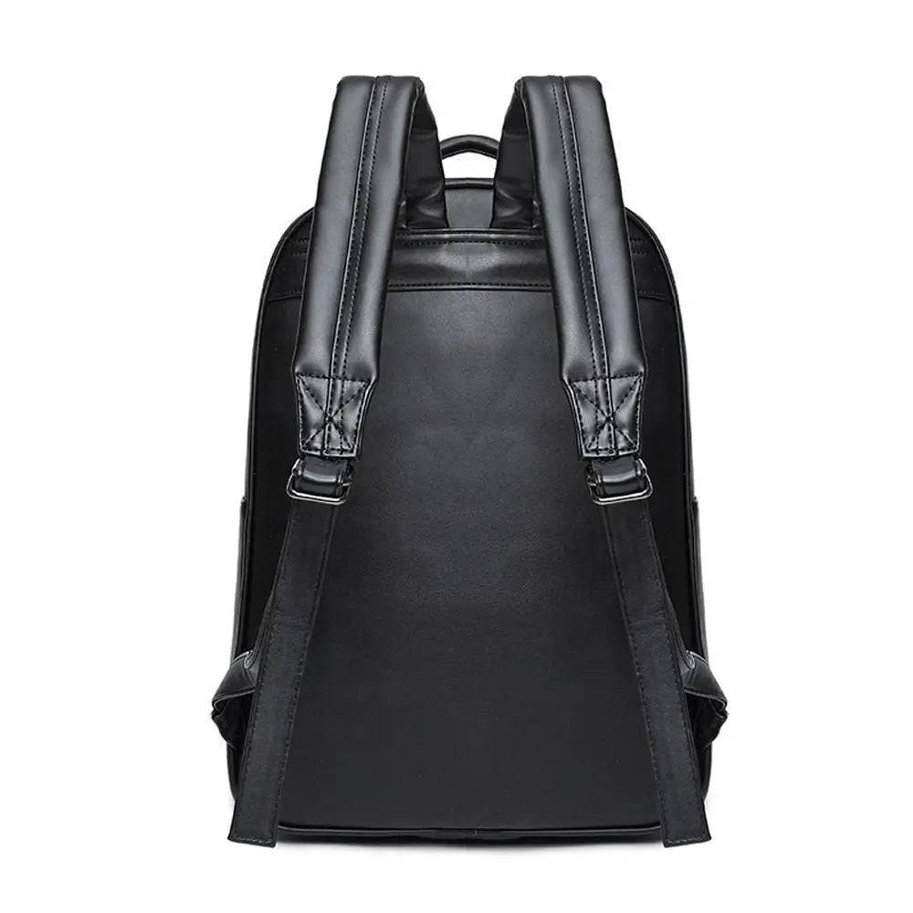 3D evil bat design PU studded computer backpack bag by Rossie Viren with padded straps and multiple compartments.