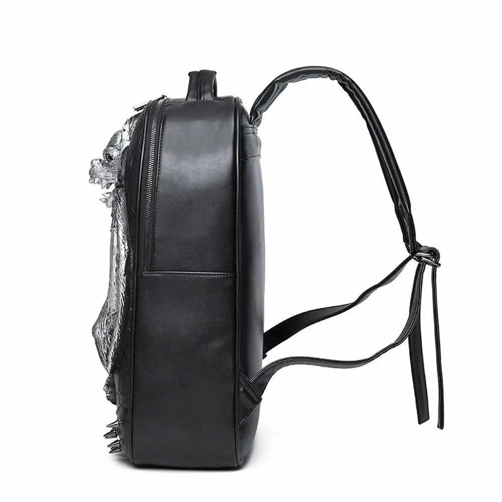 3D evil bat design on black PU studded computer backpack by Rossie Viren, with padded shoulder straps and multiple compartments.