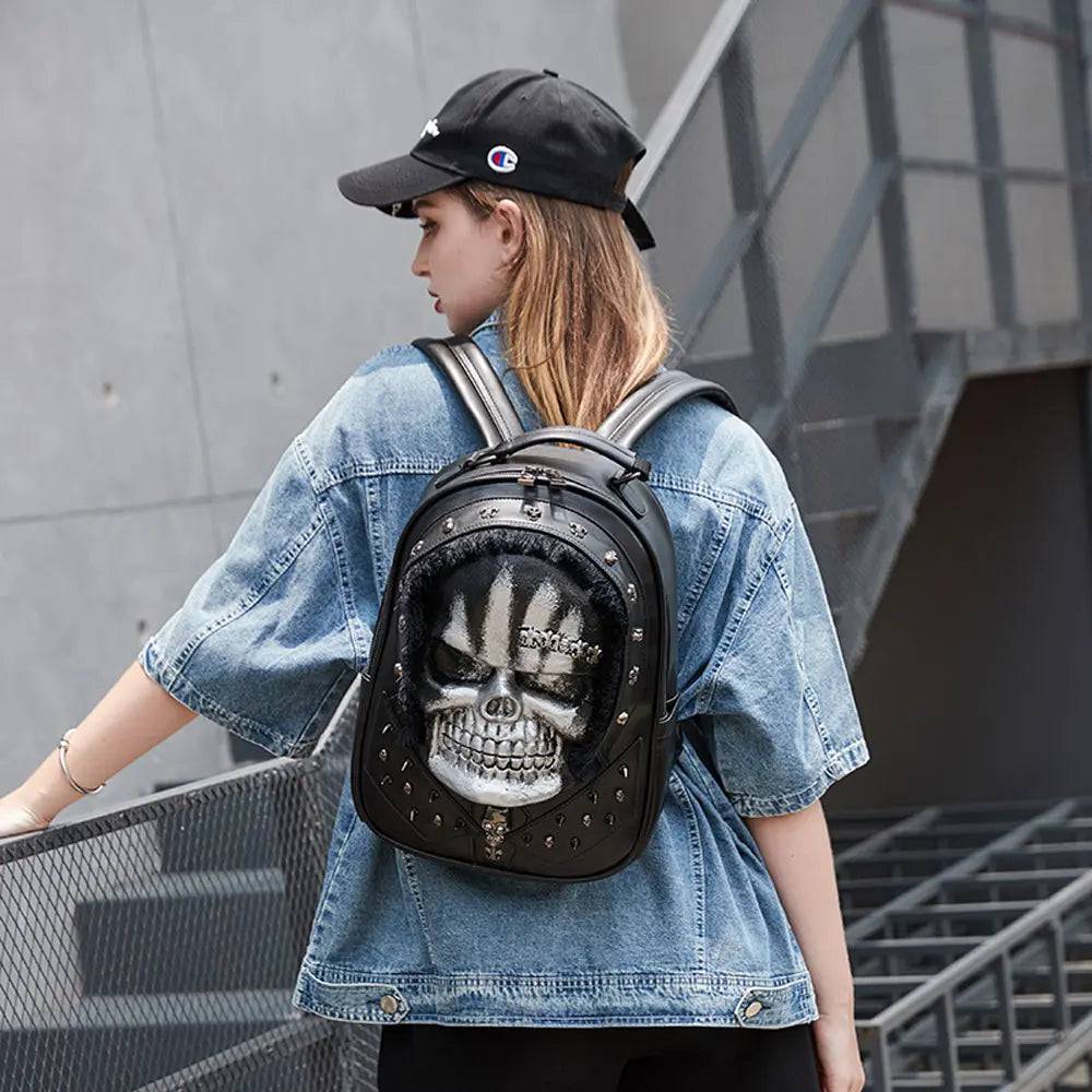 Rossie Viren 3D skull messenger backpack with studded design and faux hair accents, featuring a bold, eye-catching style.