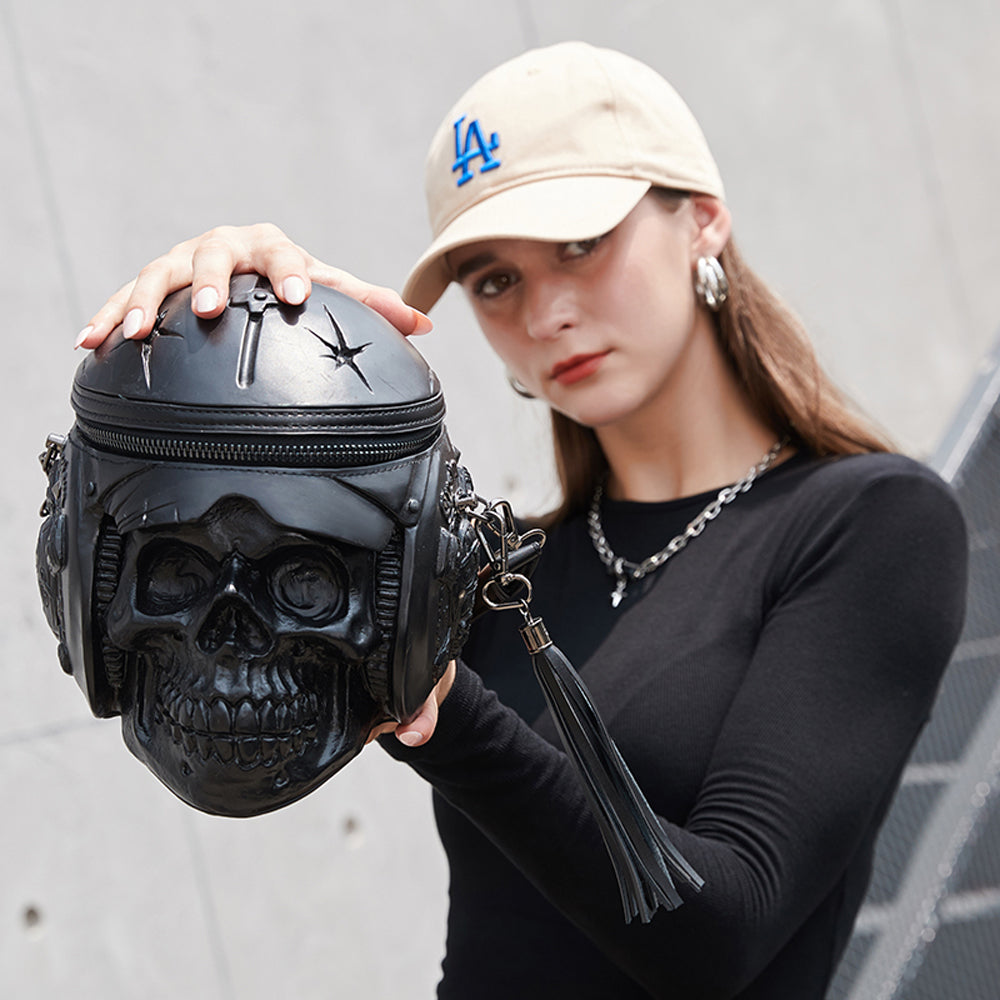 Rossie Viren 3D Skull cross body bag featuring helmet and earphone design, with a handle and shoulder strap.