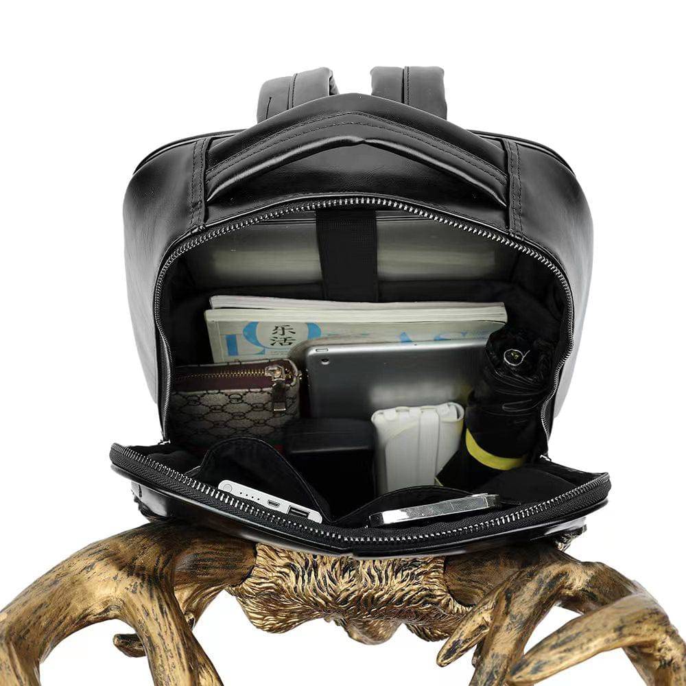 Rossie Viren 3D cow head studded backpack showcasing detailed cow face design and stud embellishments on a fashionable backpack.