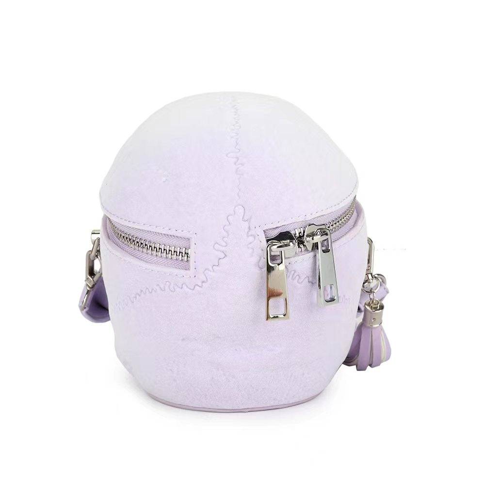 Lilac suede 3D skull crossbody handle bag by Rossie Viren, mini size with shoulder strap and unique design.
