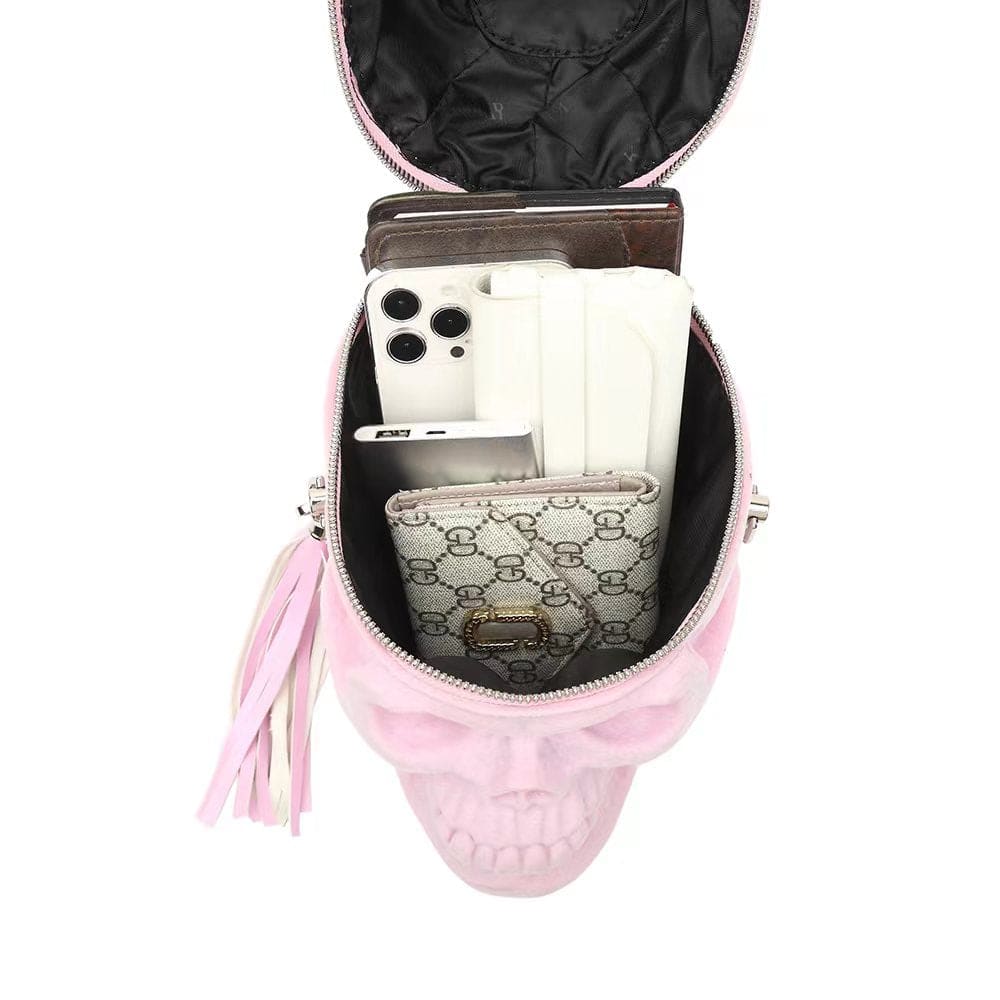 Pink suede 3D skull cross body handle bag by Rossie Viren, featuring a mini size with a stylish shoulder strap.