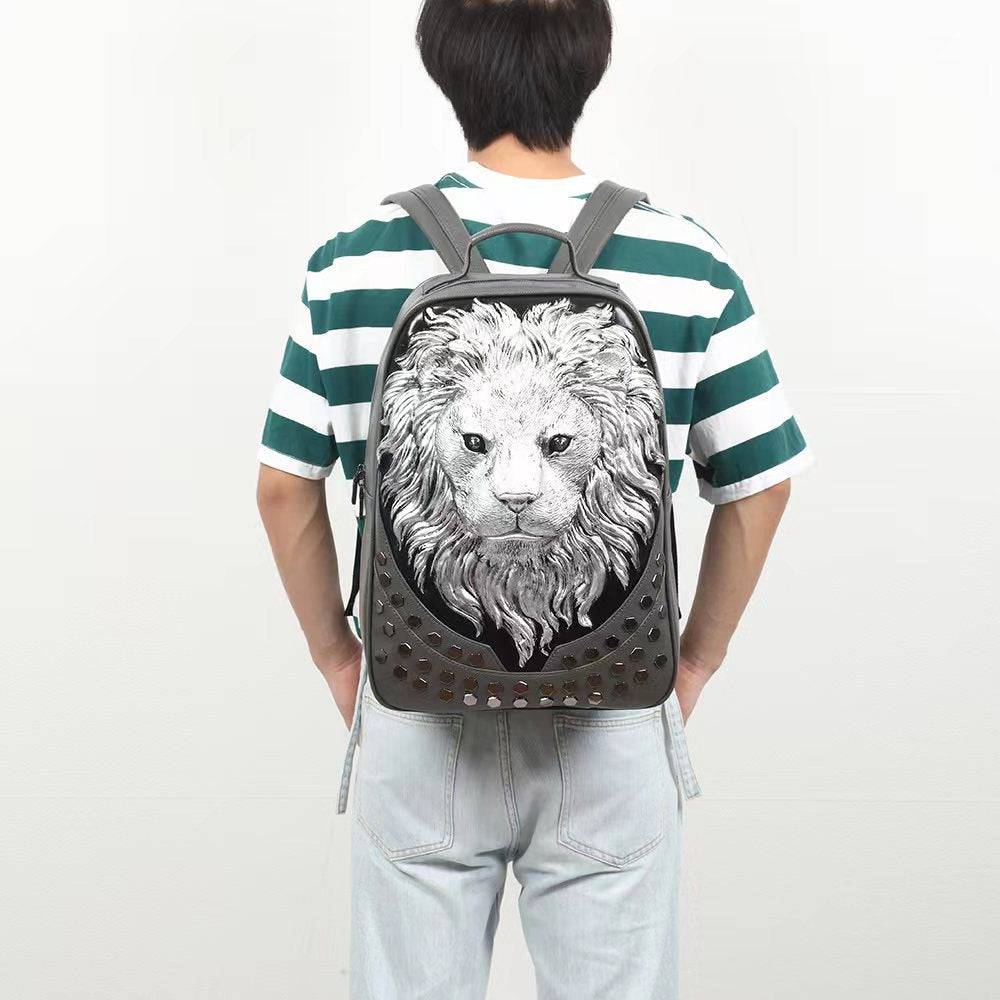 Rossie Viren 3D lion studded soft PU leather backpack featuring flat design, ideal for travel and carrying a laptop.