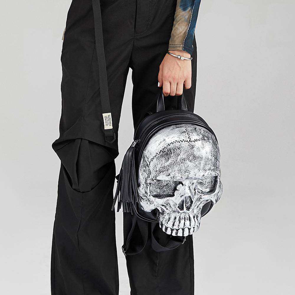 Rossie Viren 3D Skull Backpack with built-in speaker, small size, featuring a detailed 3D skull design for stylish carry.