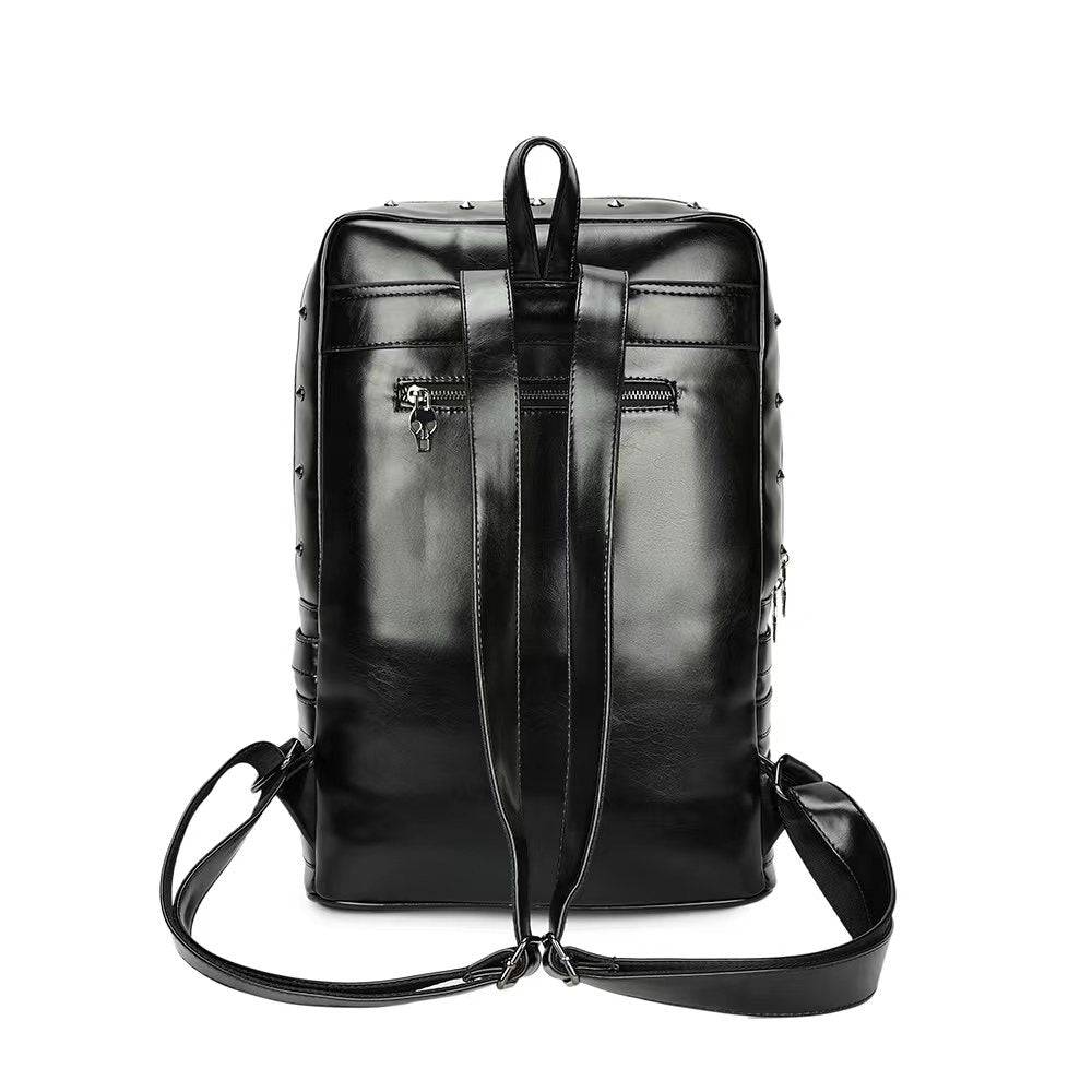 3D skull design backpack by Rossie Viren with rivet studs, black PU leather, ideal for travel, school, or punk style laptop carrying.