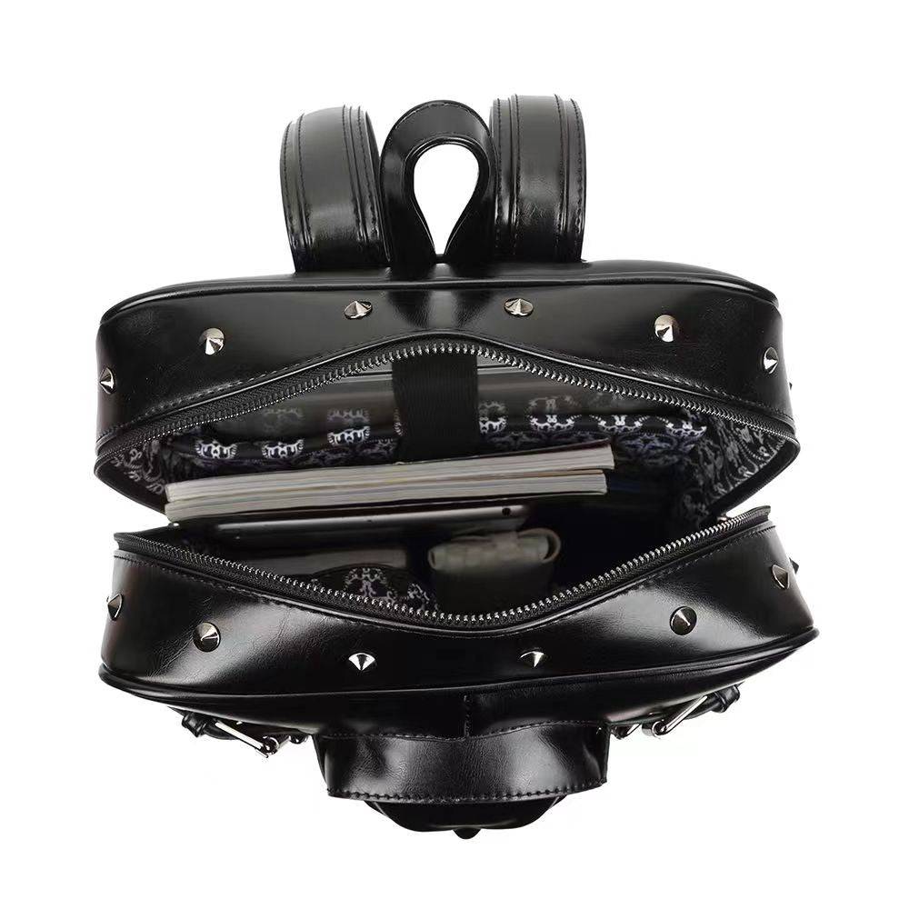 Rossie Viren 3D Skull backpack with rivet buckle, PU leather, punk style, suitable for travel, school, or laptop carrying.