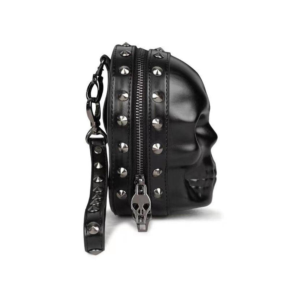 Black 3D skull handle wrist bag by Rossie Viren, featuring a stylish messenger bag design with a unique skull handle.