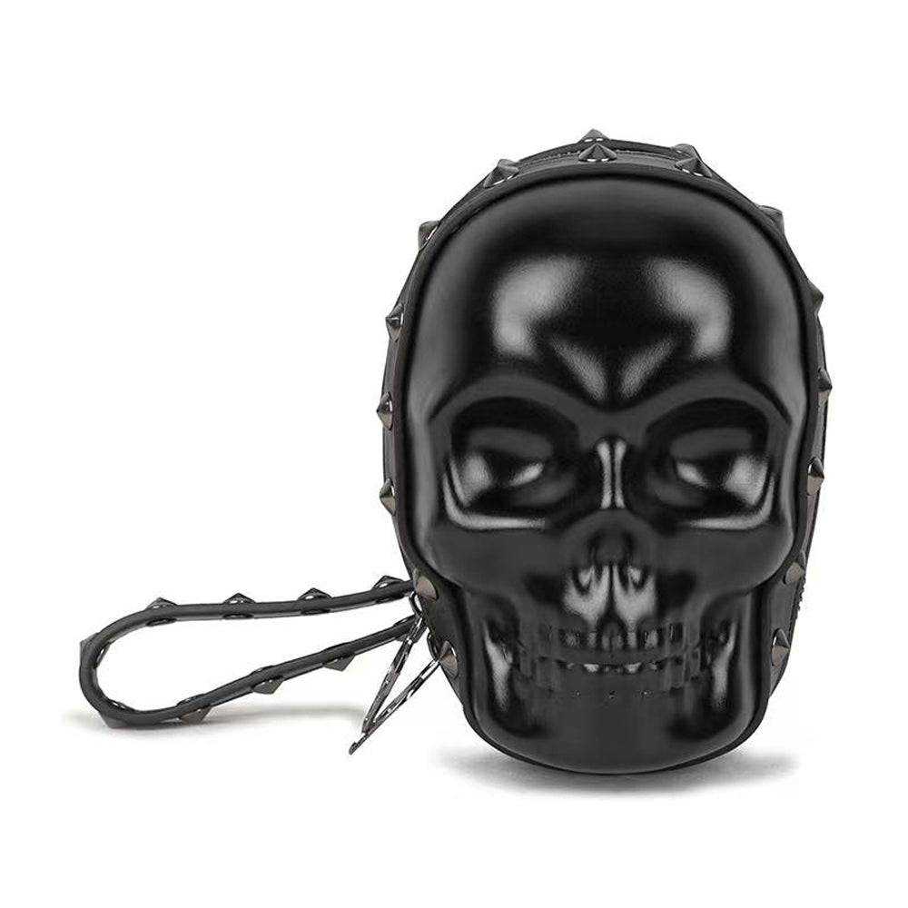 Black 3D skull handle wrist bag by Rossie Viren, featuring a stylish messenger bag design with a unique skull detail.