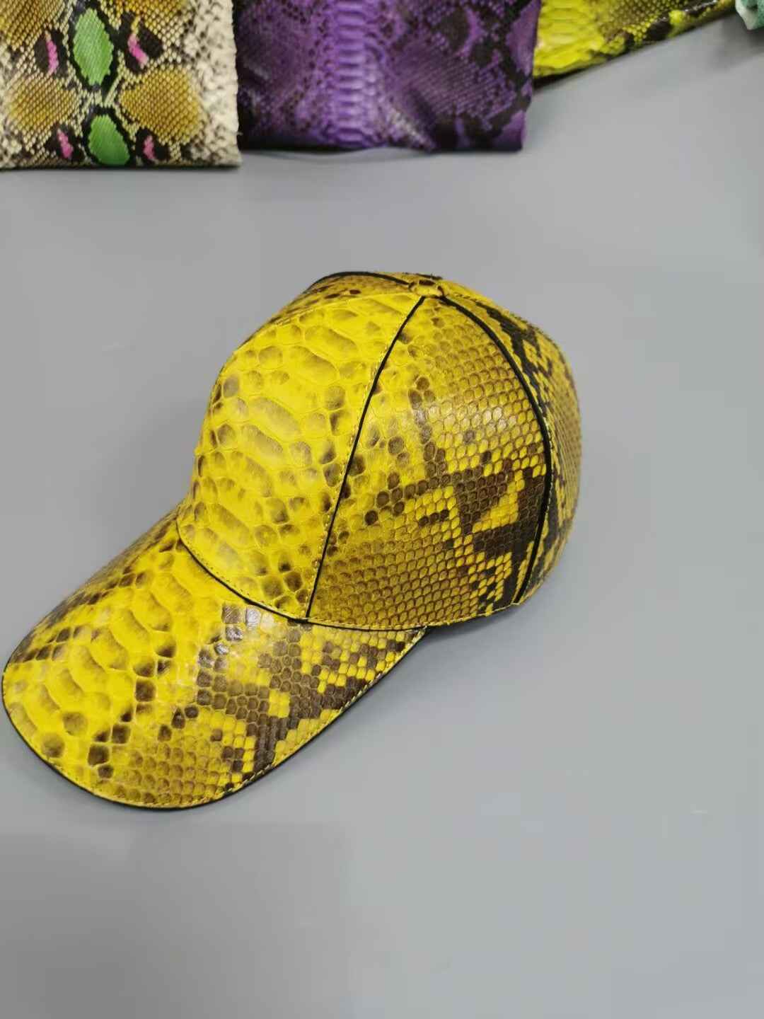 Rossie Viren Python Baseball Cap showing a classic design with a curved brim and adjustable strap.