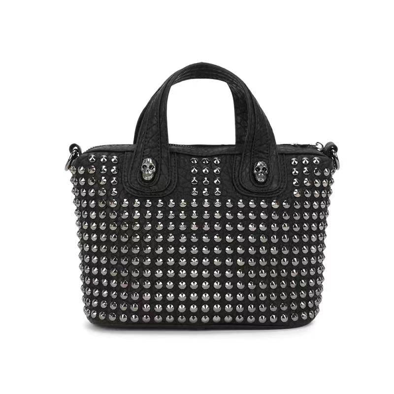 Rossie Viren 3D crystal skull shoulder bag with studded tote design, featuring a unique and edgy style.