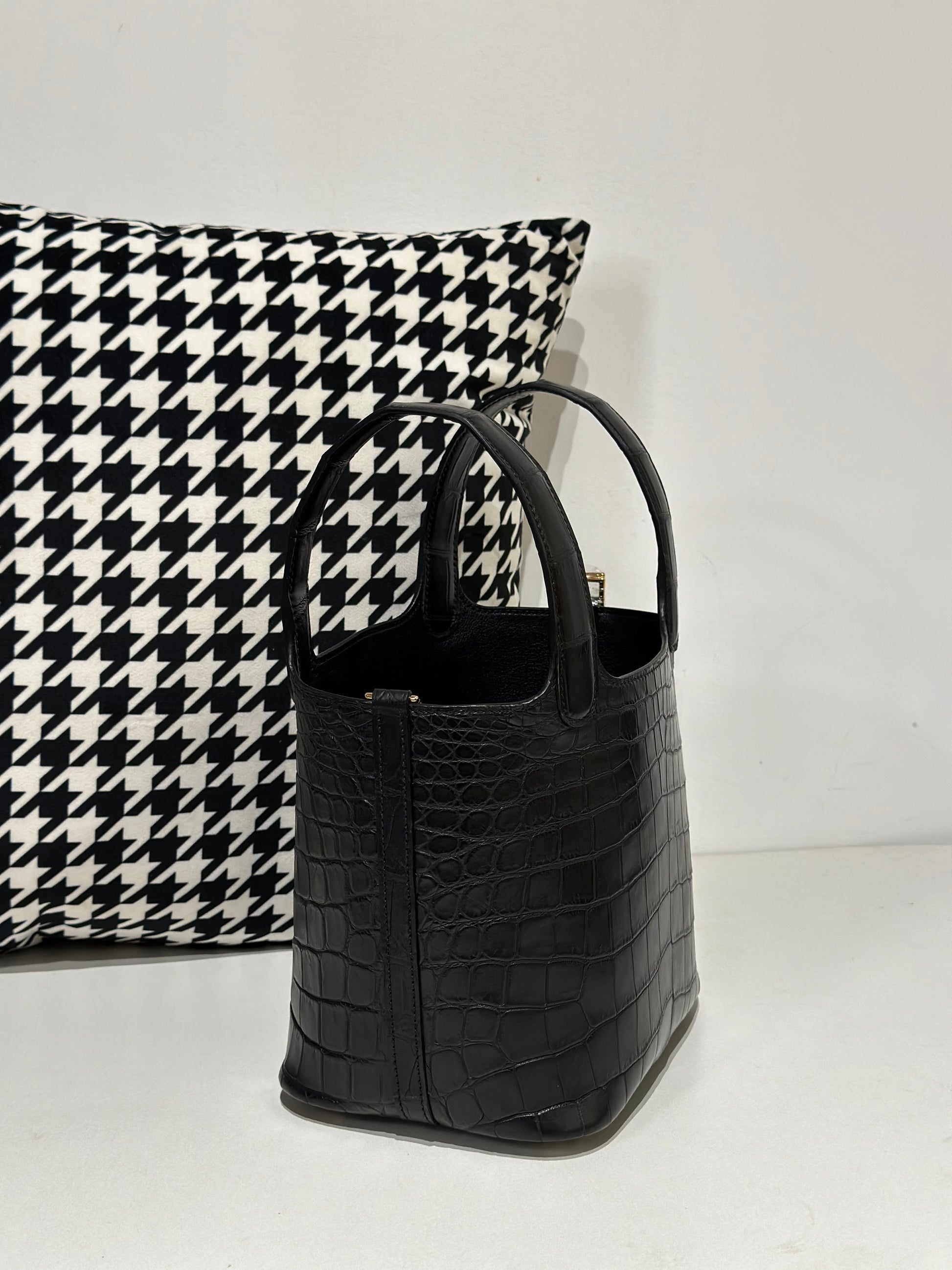 Women's black genuine crocodile leather cross body handbag by Rossie Viren featuring a small, stylish design and textured crocodile skin.