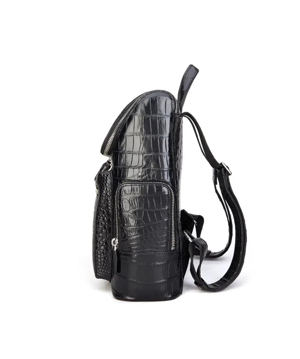 Black crocodile leather backpack by Rossie Viren featuring a sleek design and sturdy straps, ideal for stylish everyday use.