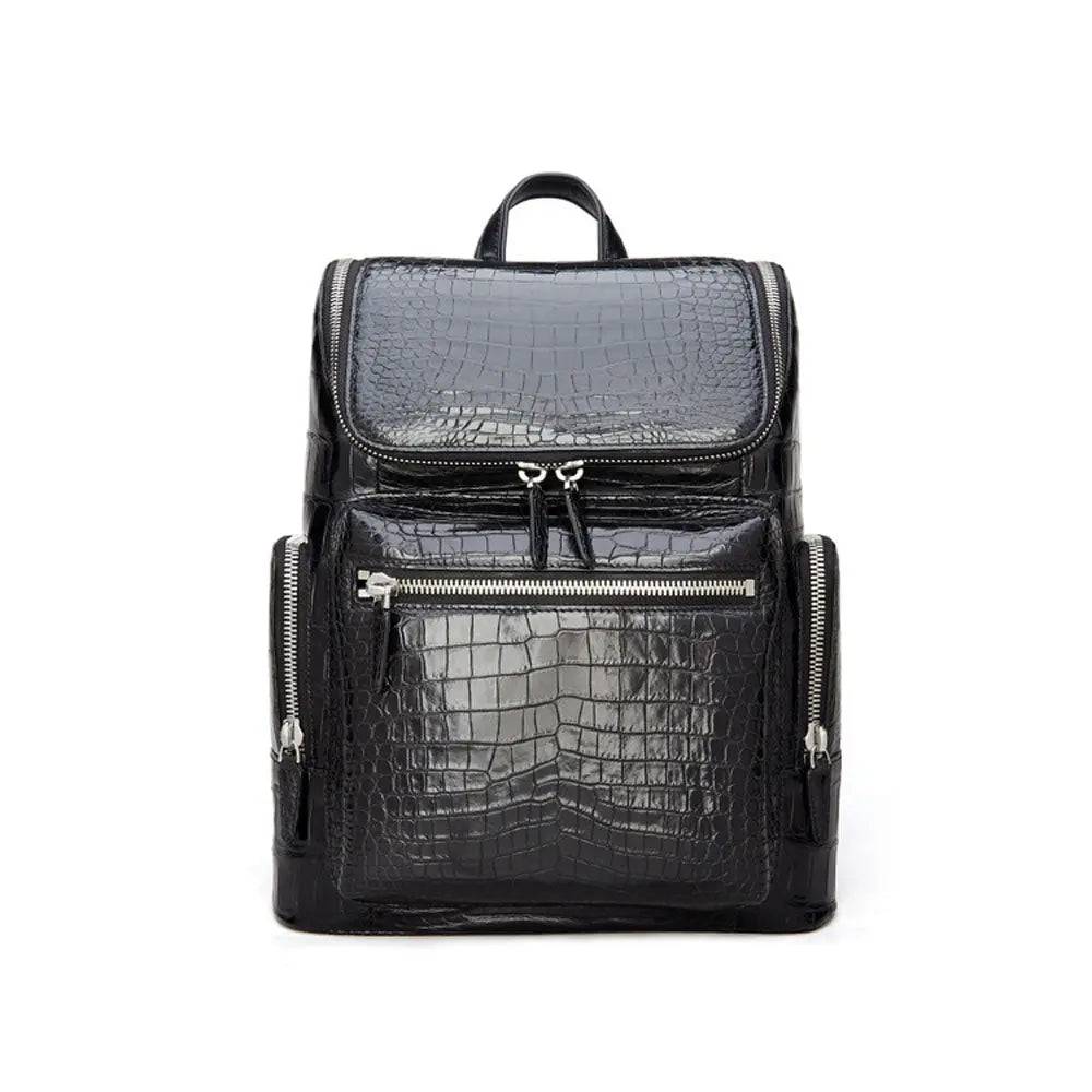 Black crocodile leather backpack by Rossie Viren featuring a sleek design with top handle and adjustable shoulder straps.