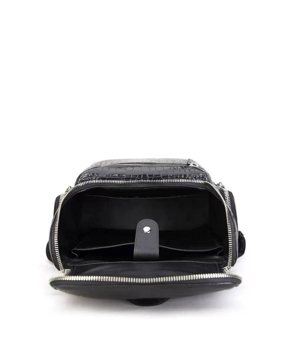 Black crocodile leather backpack by Rossie Viren, featuring a textured finish, sturdy straps, and multiple compartments for everyday use.