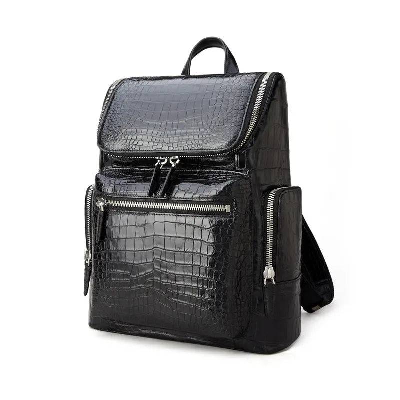 Black crocodile leather backpack by Rossie Viren featuring a sleek design with top handles and adjustable shoulder straps.