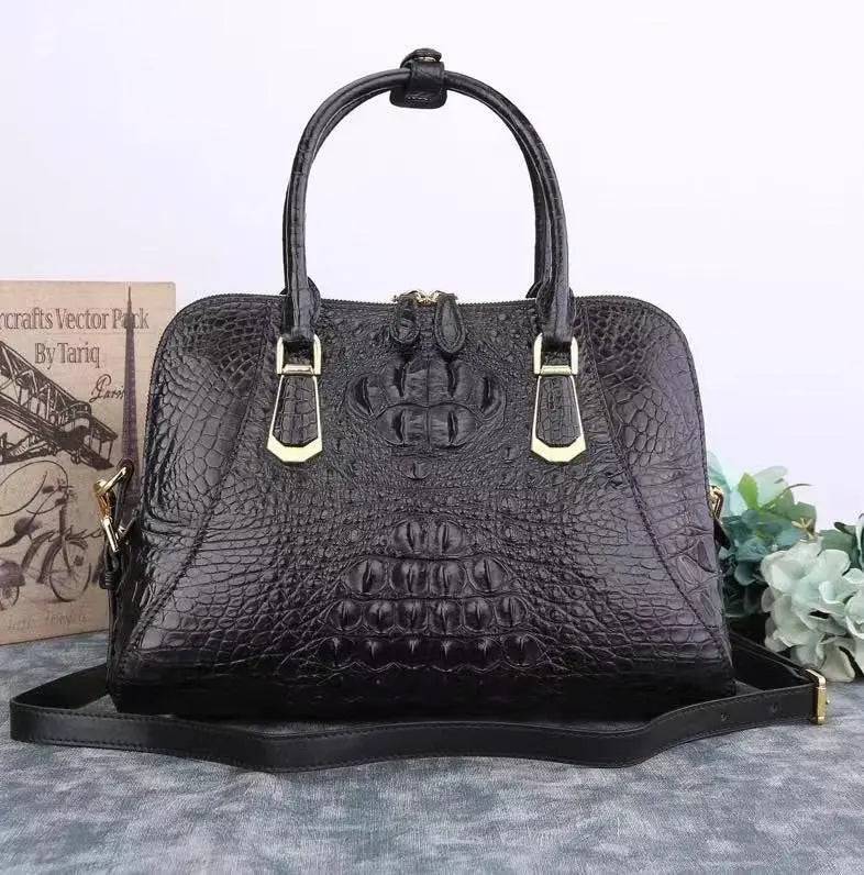 Black crocodile leather briefcase handbag with shell style design by Rossie Viren, featuring textured crocodile pattern.