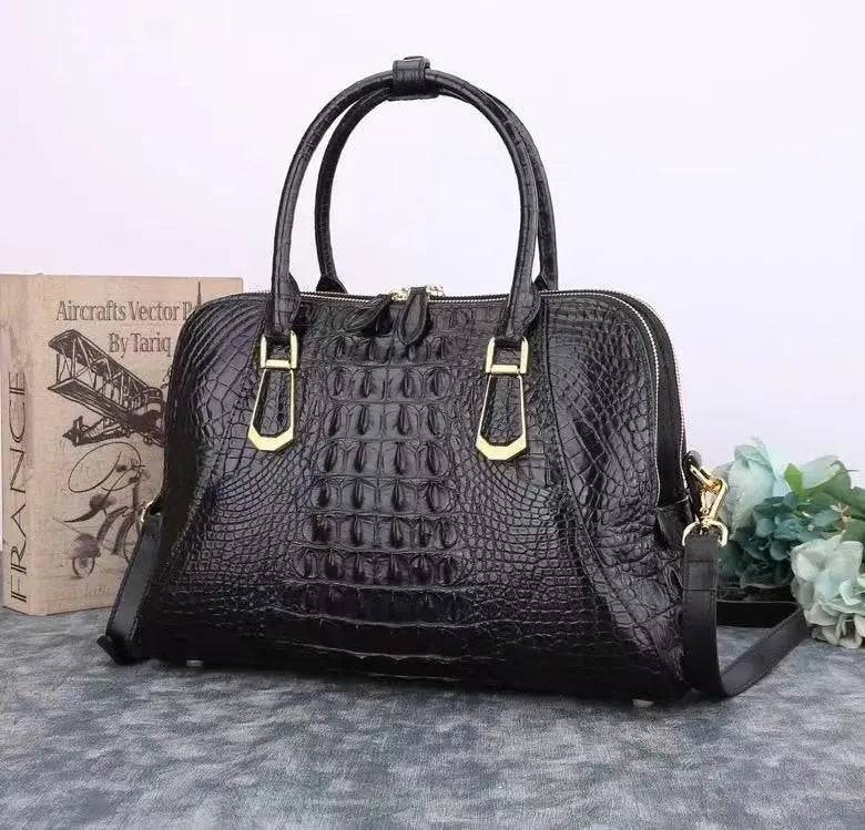 Black crocodile leather briefcase handbag with shell style design by Rossie Viren, featuring a textured crocodile pattern and sleek finish.