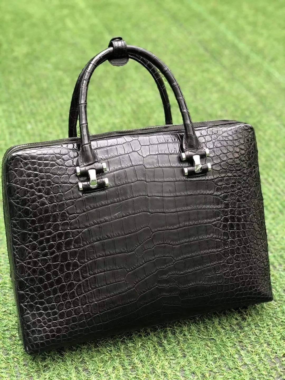 Black genuine crocodile leather briefcase by Rossie Viren with side password lock, showcasing a sleek, textured exterior and professional design.