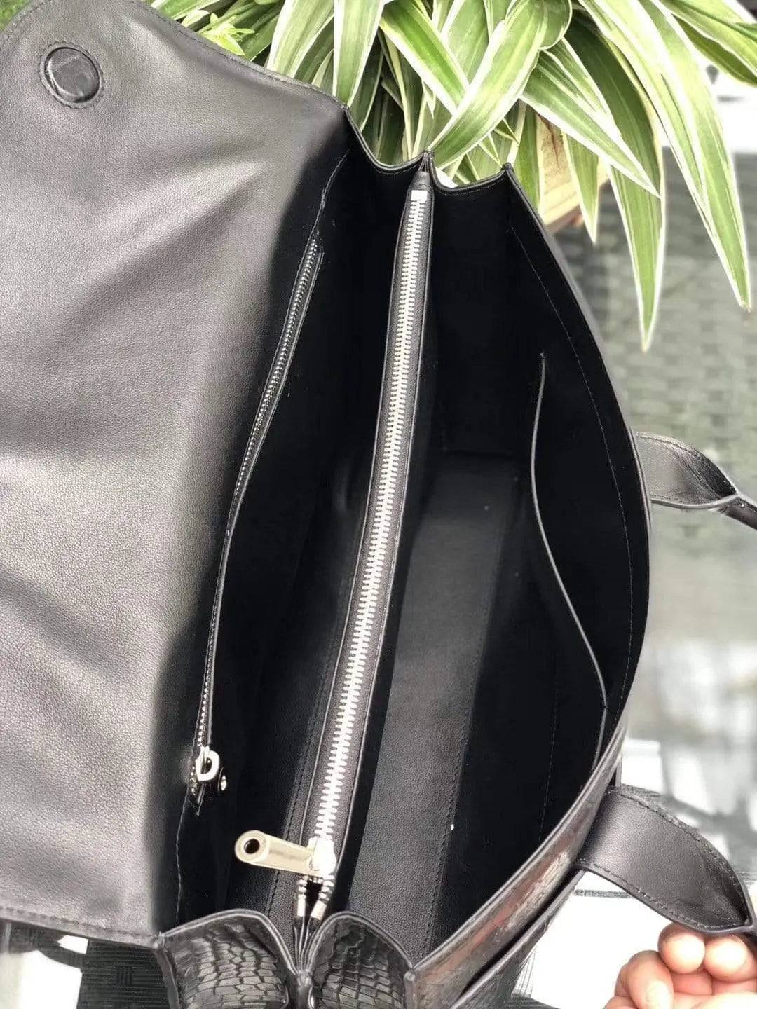 Black genuine crocodile leather foldover briefcase with sleek design, Rossie Viren crocodile briefcase, showcasing textured reptile leather.