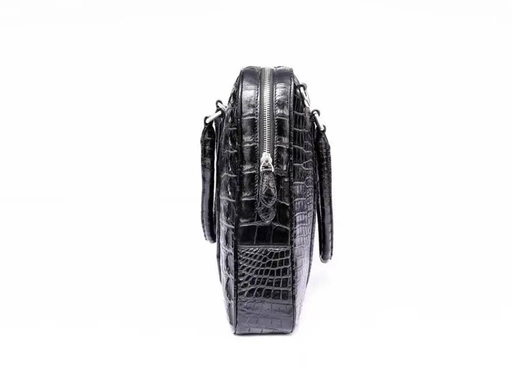 Black Rossie Viren crocodile leather travel laptop briefcase with sturdy handles and sleek design for professional use.