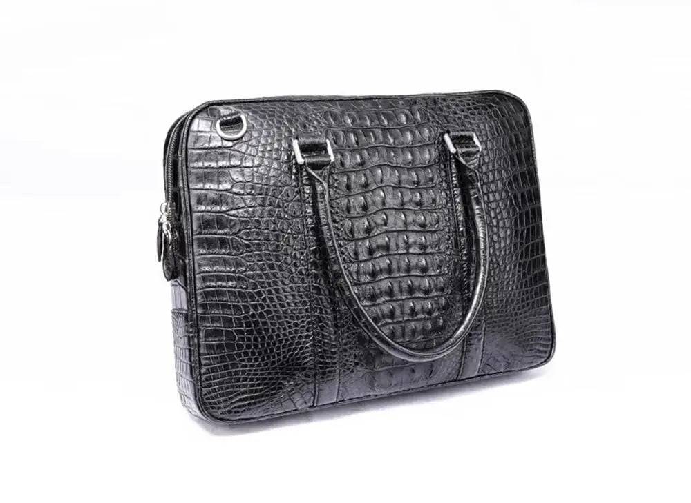 Black Rossie Viren crocodile leather travel laptop briefcase with sleek design and sturdy handle.