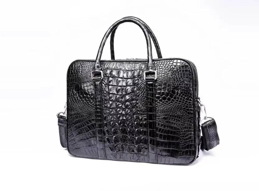 Black Rossie Viren crocodile leather travel laptop briefcase with sleek handles and structured design.