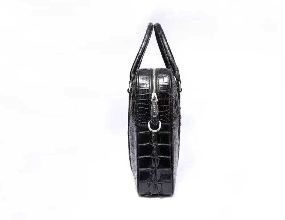 Black Rossie Viren crocodile leather travel laptop briefcase with sturdy handle and sleek design.